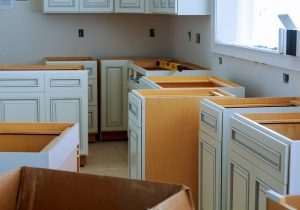 Installation of kitchen cabinets the drawer in cabinet.